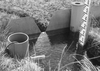 correct point of measurement location for a thin-plate weir