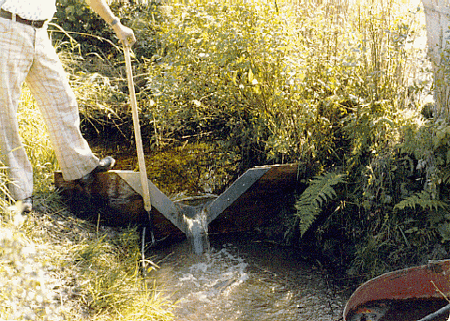 Wooden Weir with metal crest measuring Steam Flow