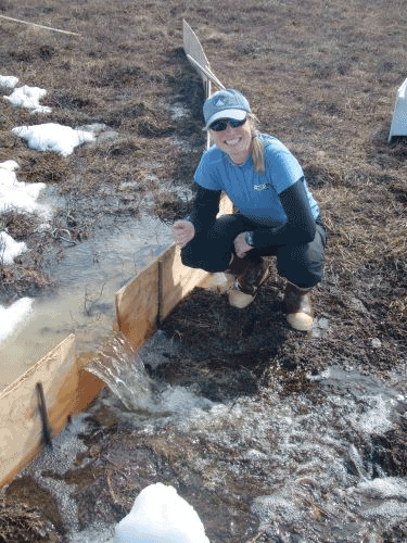 wooden rectangular weir installation measuring arctic watersheds in the Kaparuk River Valley