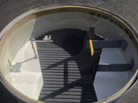 recessed fiberglass grating over a Cutthroat flume in a Packaged Metering Manhole